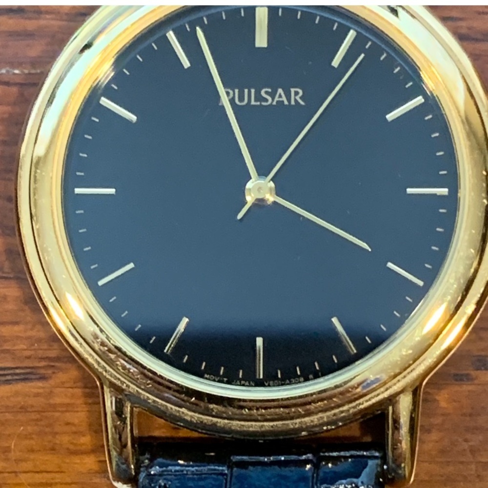 Vintage Pulsar Gold and Black Men's Watch